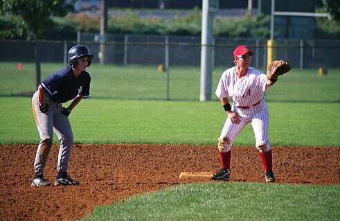 Lisa holds the runner at second base