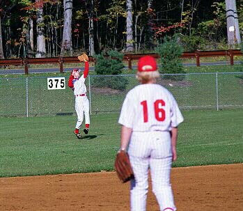 Michelle leaps for an Indian line drive in left field