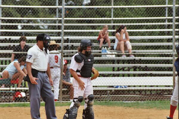 Carley DiPrenda catching for the EP Angels on August 3, 2003