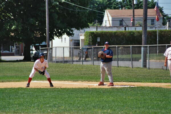 Justine Deluccio looking to steal a base on July 13, 2003